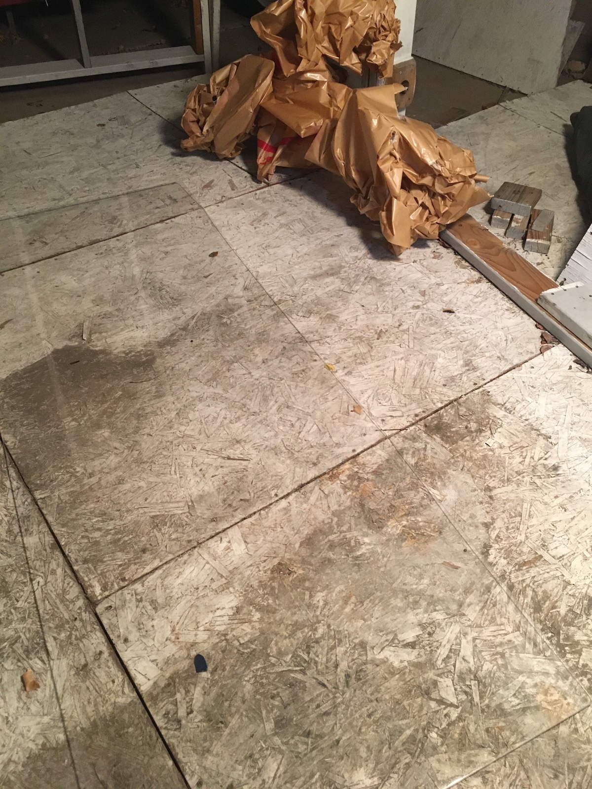 IMG_1552.jpeg Cut acrylic panels stacked on workshop surface